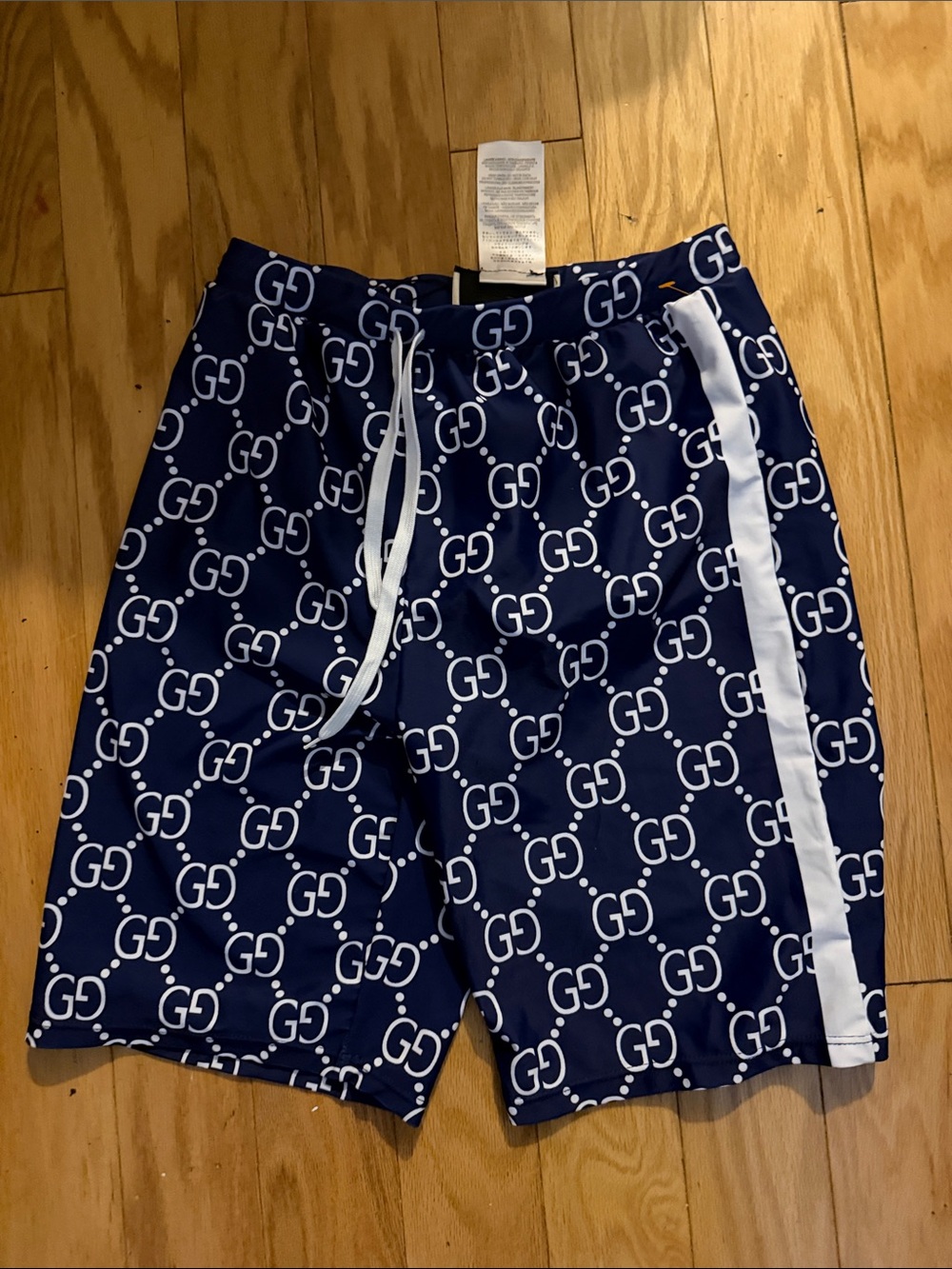 Gucci Men's Navy Blue GG-Print Swim Trunks with White Side Stripe